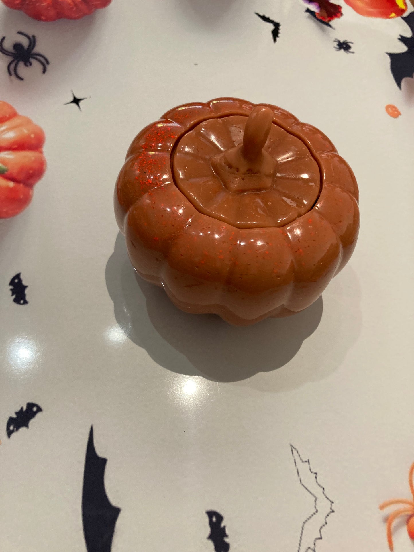 Wax pumpkin with mini pumpkins