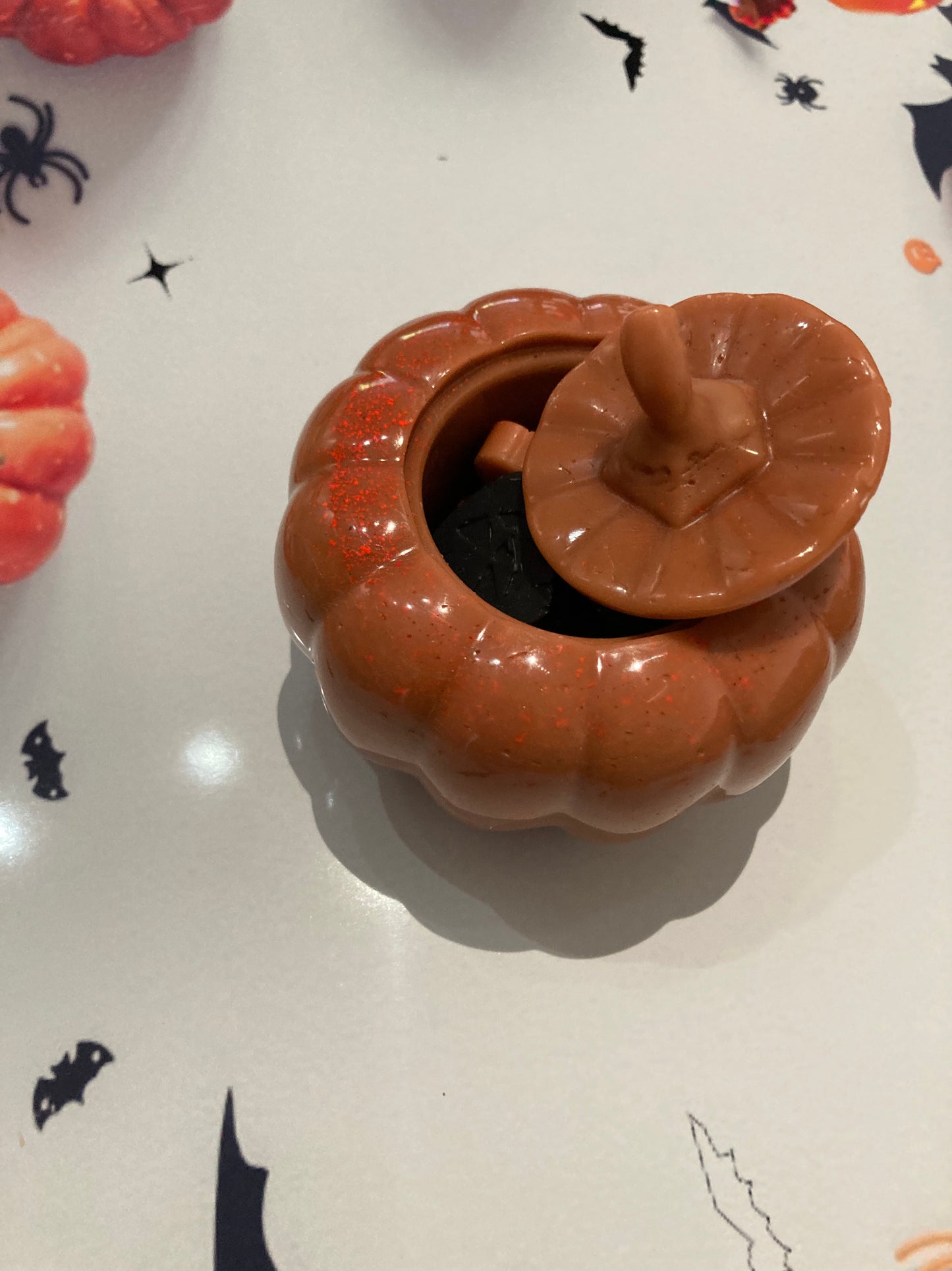 Wax pumpkin with mini pumpkins