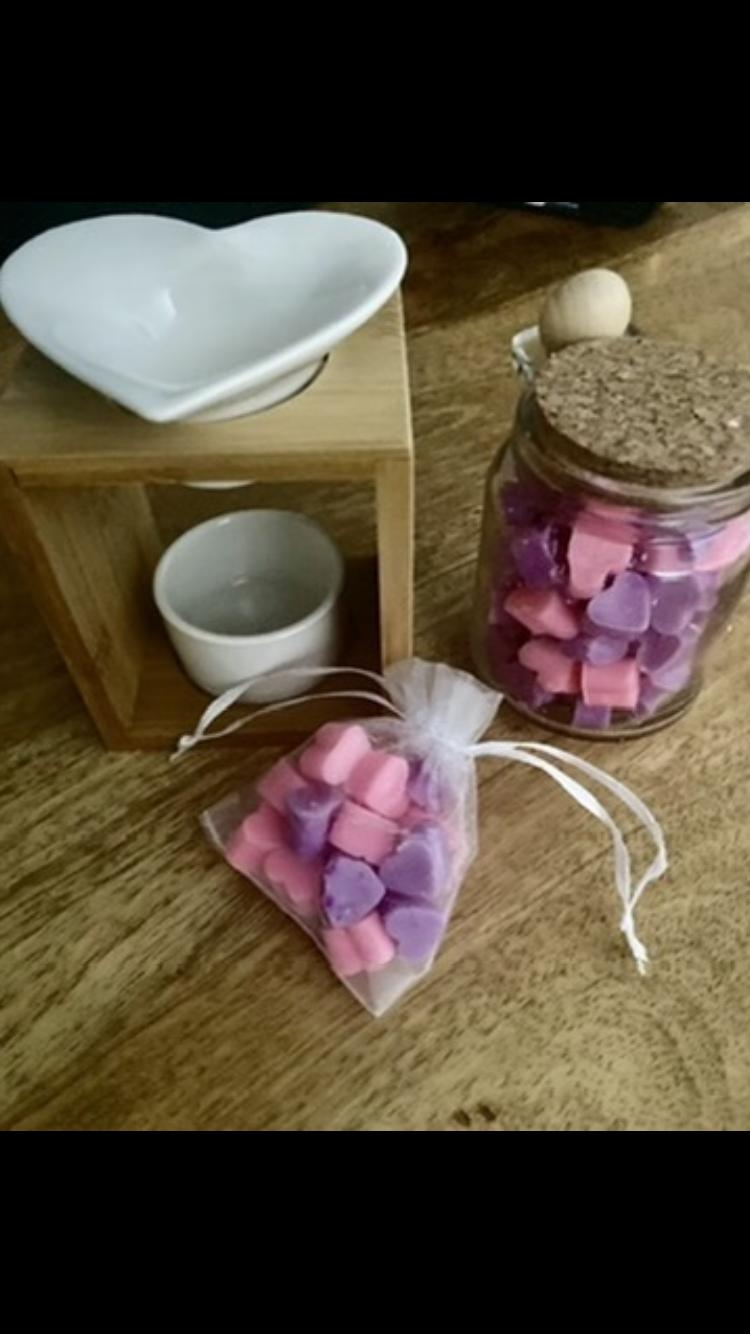 Jars filled with mini melts and a scoopie